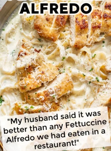 Delicious Chicken Fettuccine Alfredo served with garnished parsley.