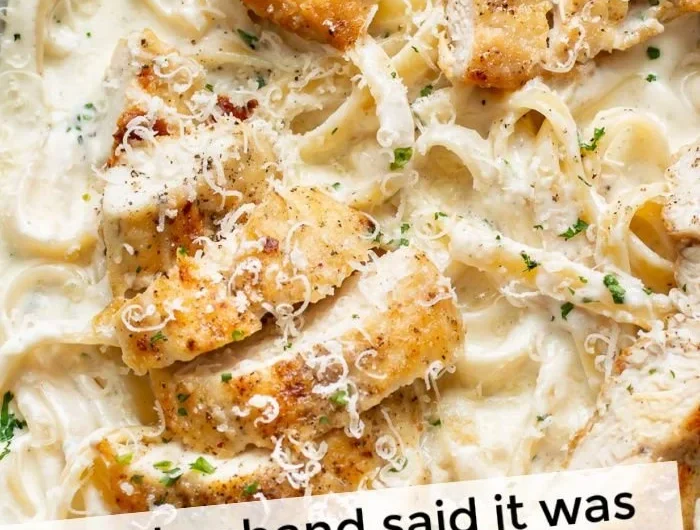 Delicious Chicken Fettuccine Alfredo served with garnished parsley.