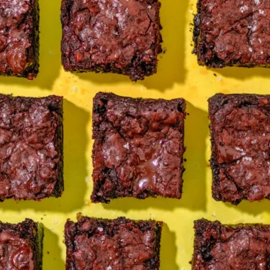 90-calorie protein brownies with crackly tops served on a plate