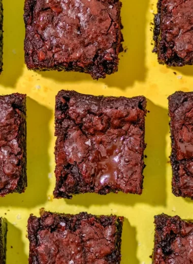 90-calorie protein brownies with crackly tops served on a plate