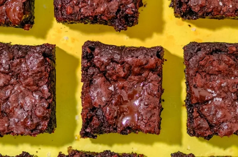 90-calorie protein brownies with crackly tops served on a plate