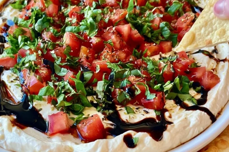 Delicious bruschetta dip served with crusty bread for dipping
