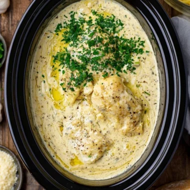 Crock Pot Angel Chicken served with herbs and sides