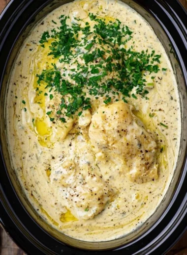 Crock Pot Angel Chicken served with herbs and sides
