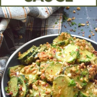 Cucumber salad topped with creamy peanut sauce.