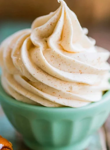 Homemade easy honey butter spread on warm biscuits.
