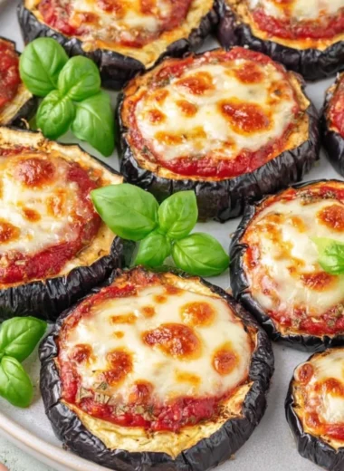 Delicious homemade eggplant pizza with fresh toppings and melted cheese.