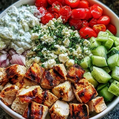 Healthy Greek Chicken Bowl with fresh vegetables and feta cheese