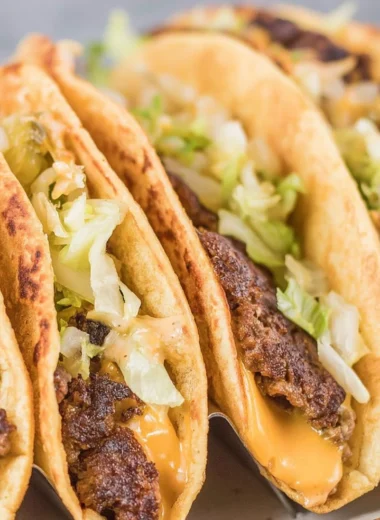Smash Burger Tacos with juicy beef, fresh toppings, and taco shells