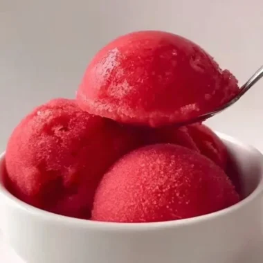 Delicious homemade strawberry sorbet served in a bowl.
