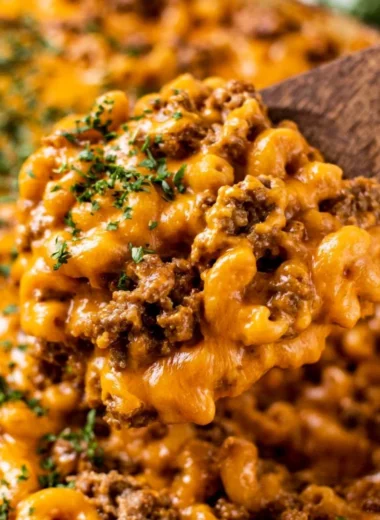 Delicious cheeseburger casserole topped with melted cheese and ground beef