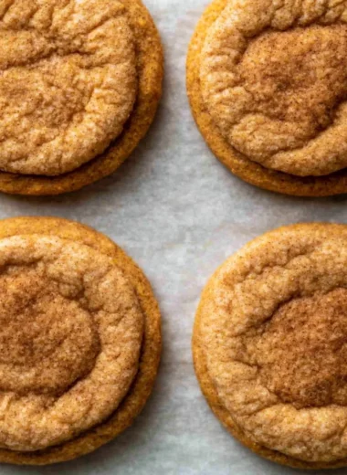 Chewy pumpkin cookies on a plate, a perfect cozy fall treat.