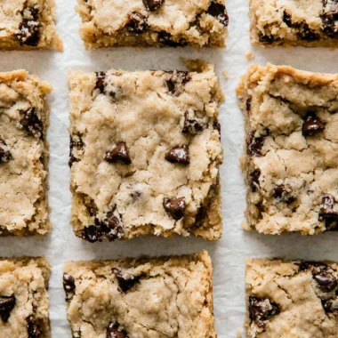 Cozy chocolate chip cookie bars baked to perfection with melted chocolate chips