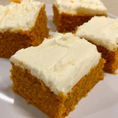 Delicious cozy pumpkin cream cheese bars topped with cream cheese frosting