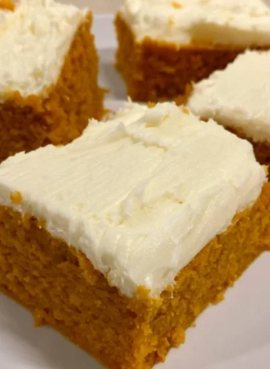 Delicious cozy pumpkin cream cheese bars topped with cream cheese frosting