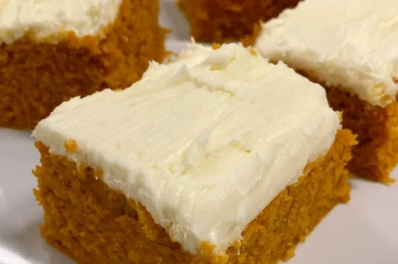 Delicious cozy pumpkin cream cheese bars topped with cream cheese frosting