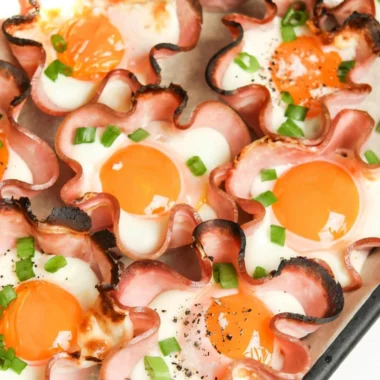 Ham and cheese egg cups baked in muffin tins for breakfast