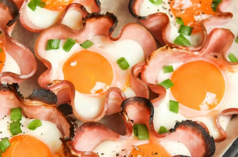 Ham and cheese egg cups baked in muffin tins for breakfast