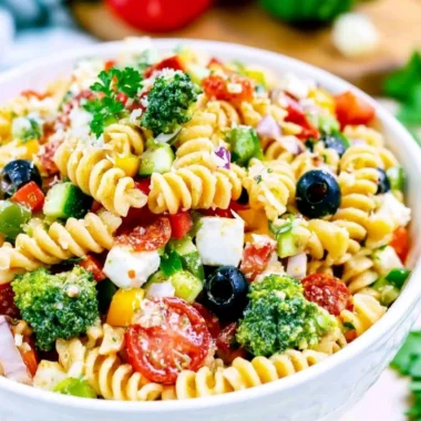 Delicious Italian pasta salad with fresh vegetables and dressing